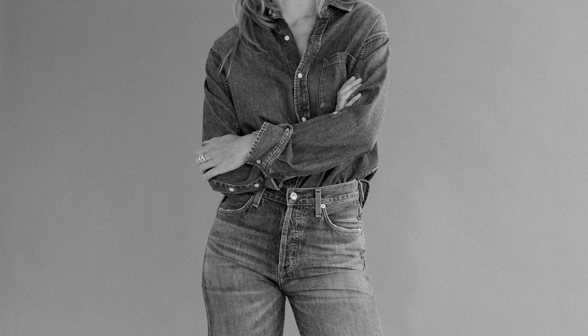 A woman  in a pair of denim from Hill's Dry Goods