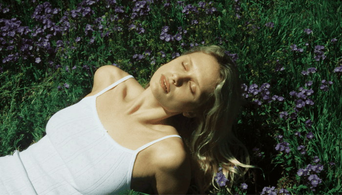 Woman in white tank