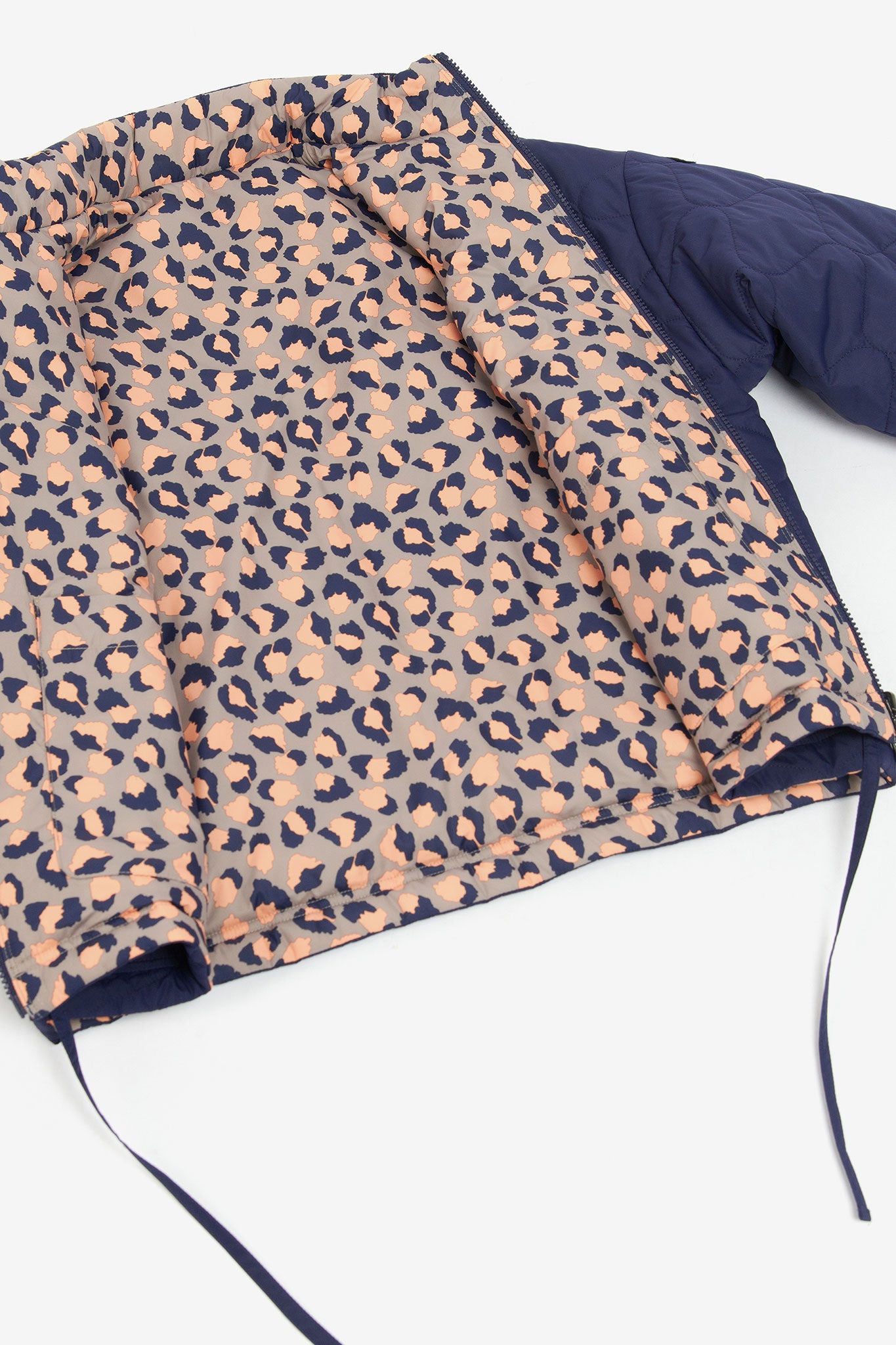 Barbour-Printed-Reversible-Apia-Quilted-Jacket-Eternal-Ink-Light-Trench-Starling-Print