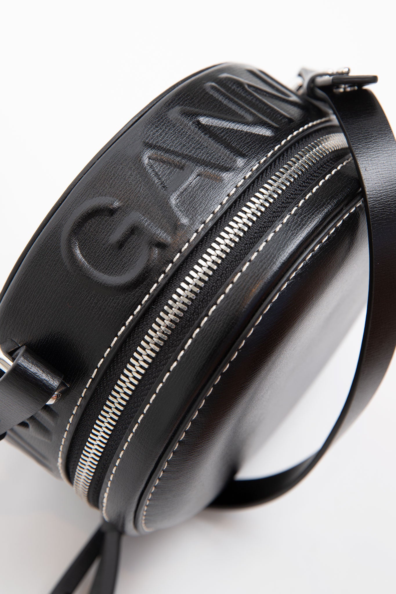 Ganni-Round-Crossbody-Logo-Bag-Black